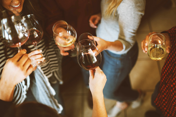A group of friends enjoying a glass of wine